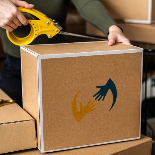Parcel box psd being packed for delivery by a small business owner